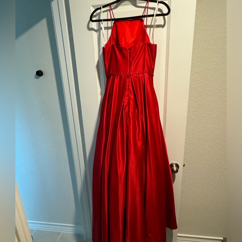 Betty Adam’s red ball gown worn once